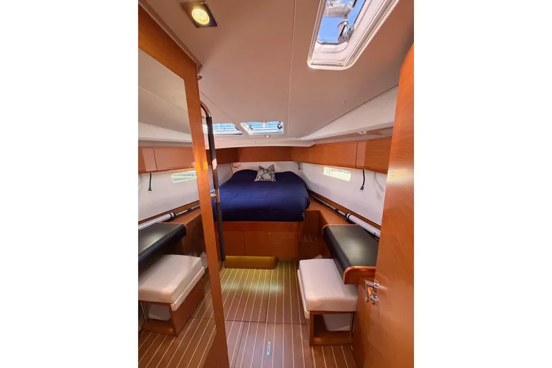 Leah Yacht Photos Pics Luxurious cabin interior of 2014 Jeanneau Sun Odyssey 469 yacht with wood finish.