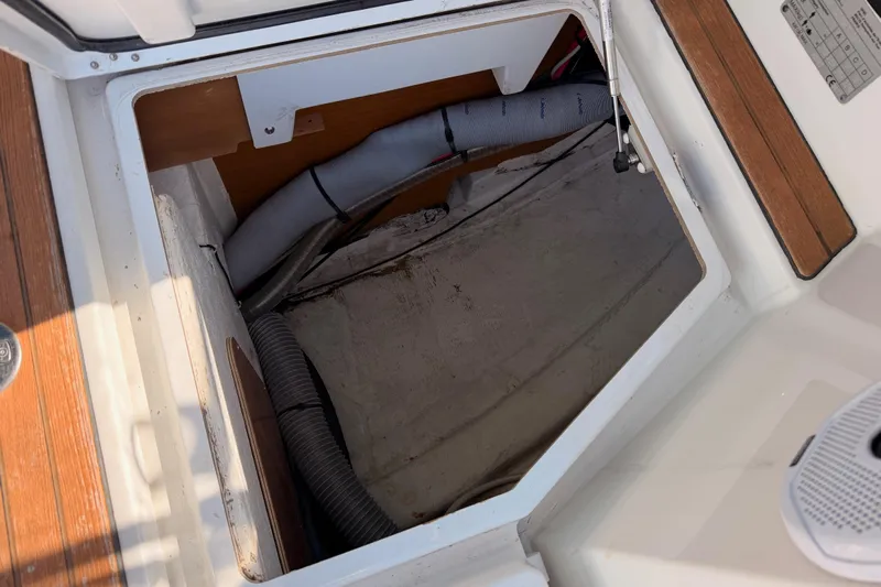 Leah Yacht Photos Pics Open storage compartment on 2014 Jeanneau Sun Odyssey 469 sailboat deck.