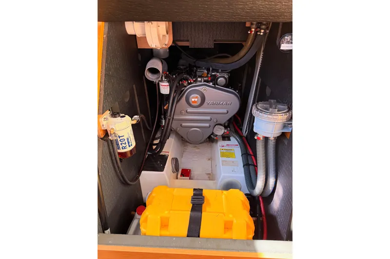 Leah Yacht Photos Pics Engine compartment of 2014 Jeanneau Sun Odyssey 469 sailboat with Yanmar engine.