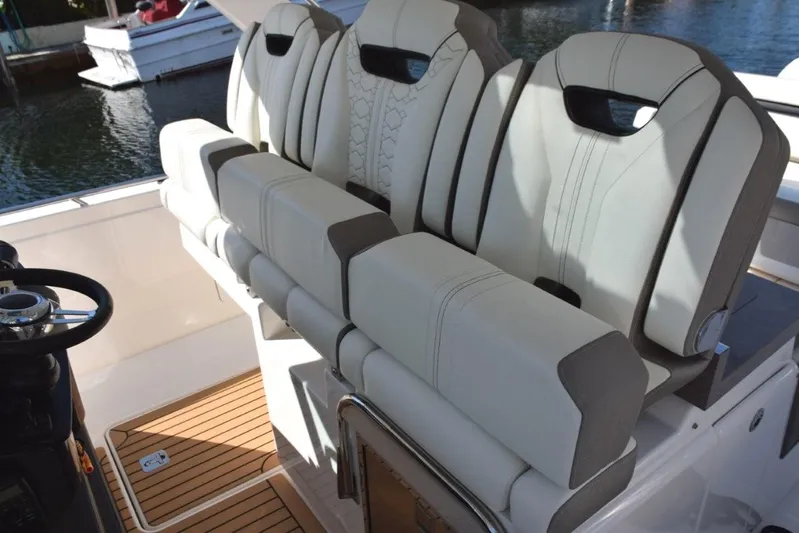 Erika Ray Yacht Photos Pics Three bucket helm seats with fold-up bolsters for standing operation