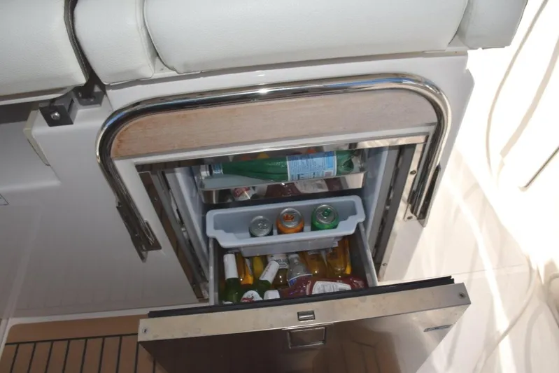 Erika Ray Yacht Photos Pics Refrigerator slide out drawer beneath helm seat