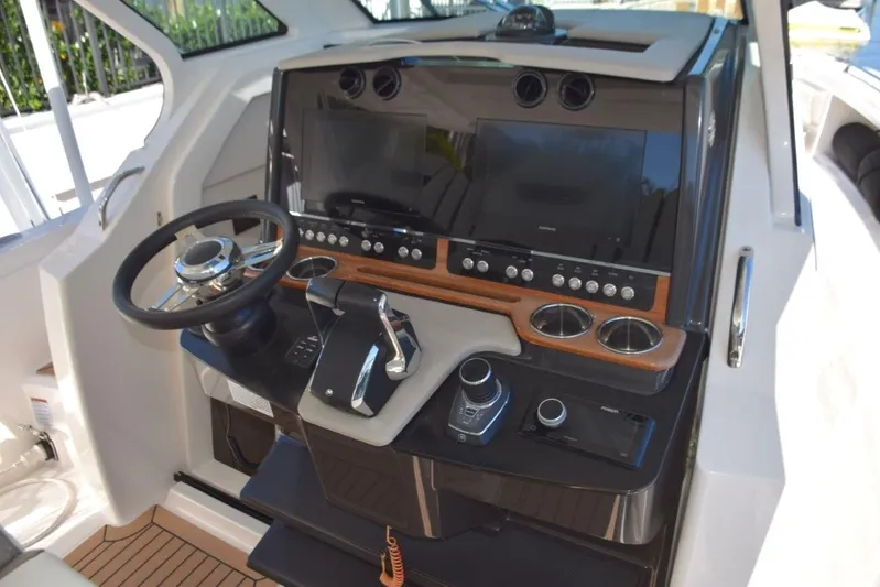 Erika Ray Yacht Photos Pics Mercury control and tilting helm wheel