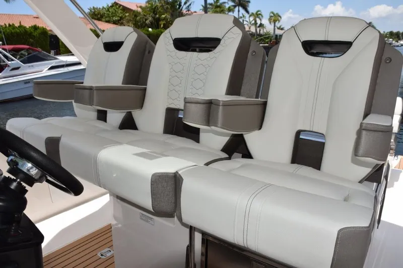 Erika Ray Yacht Photos Pics Helm Chair armrests and bolsters down