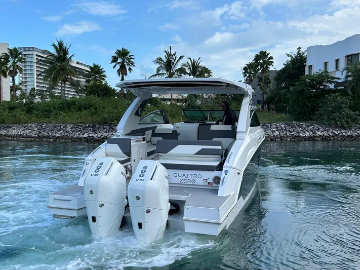 2024 Cruisers Yachts 34 Gls Ob Yacht Photos Pics 2024 Cruisers Yachts 34 GLS OB in water, featuring dual outboard engines.