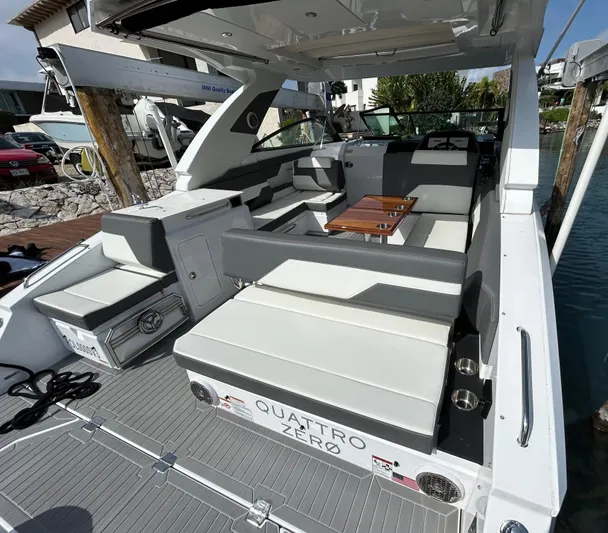 2024 Cruisers Yachts 34 Gls Ob Yacht Photos Pics 2024 Cruisers Yachts 34 GLS OB luxury boat interior with seating and table.