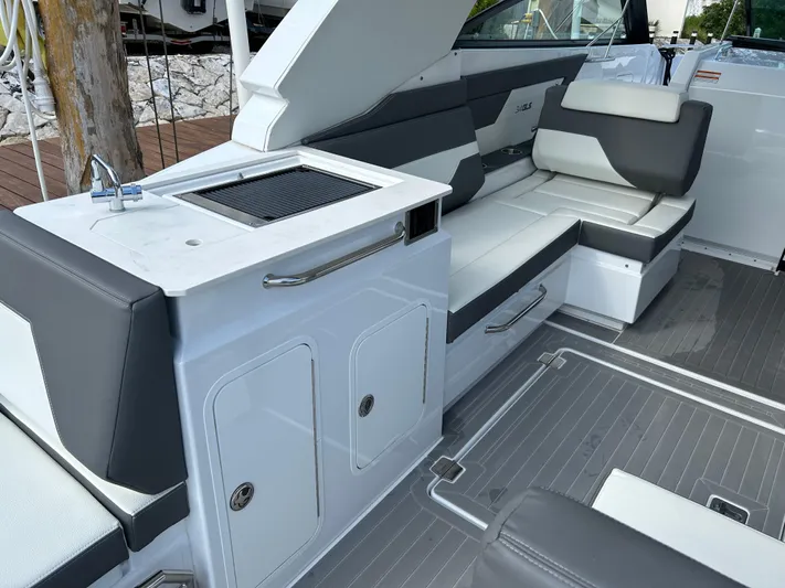 2024 Cruisers Yachts 34 Gls Ob Yacht Photos Pics 2024 Cruisers Yachts 34 GLS OB interior with sleek seating and modern amenities.
