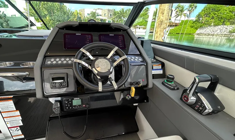 2024 Cruisers Yachts 34 Gls Ob Yacht Photos Pics 2024 Cruisers Yachts 34 GLS OB helm with modern controls and sleek design.