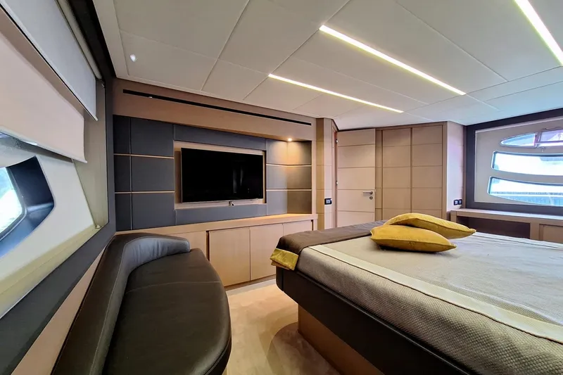 Mylo Yacht Photos Pics Luxurious interior of 2014 Pershing 74 yacht with modern design and elegant furnishings.