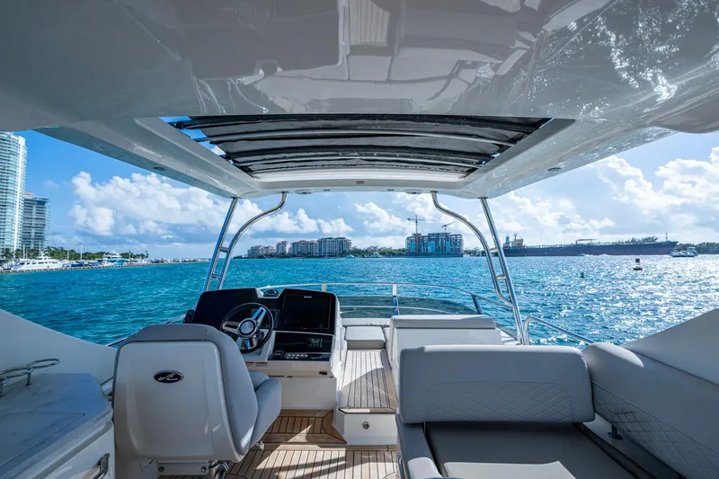  Yacht Photos Pics Luxurious 2018 Sea Ray L550 Fly yacht interior with ocean view and modern helm.