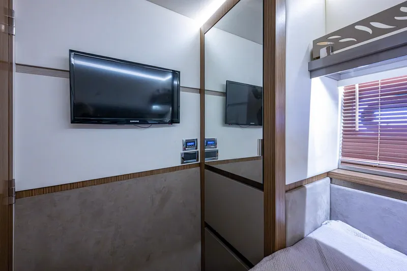  Yacht Photos Pics Luxurious 2018 Sea Ray L550 Fly cabin interior with TV and modern decor.