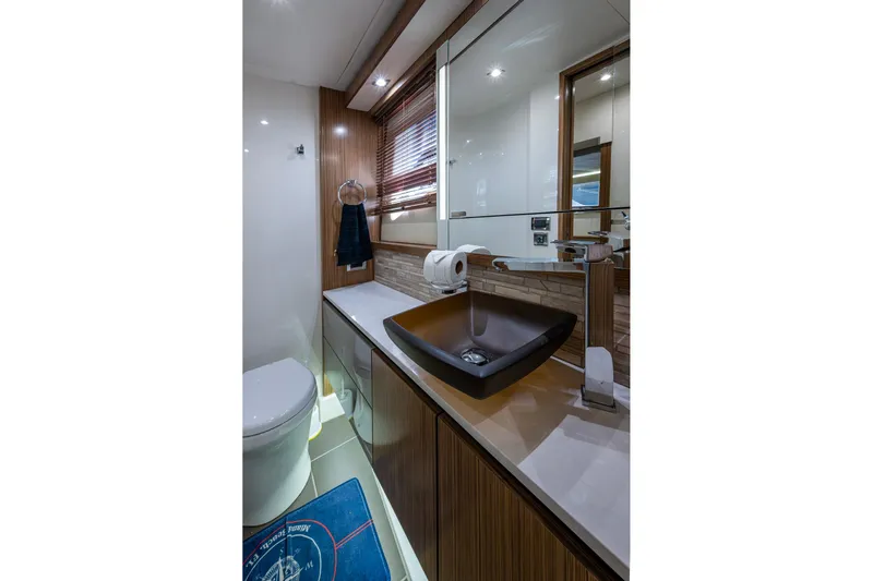  Yacht Photos Pics Luxurious bathroom in 2018 Sea Ray L550 Fly yacht with modern fixtures.