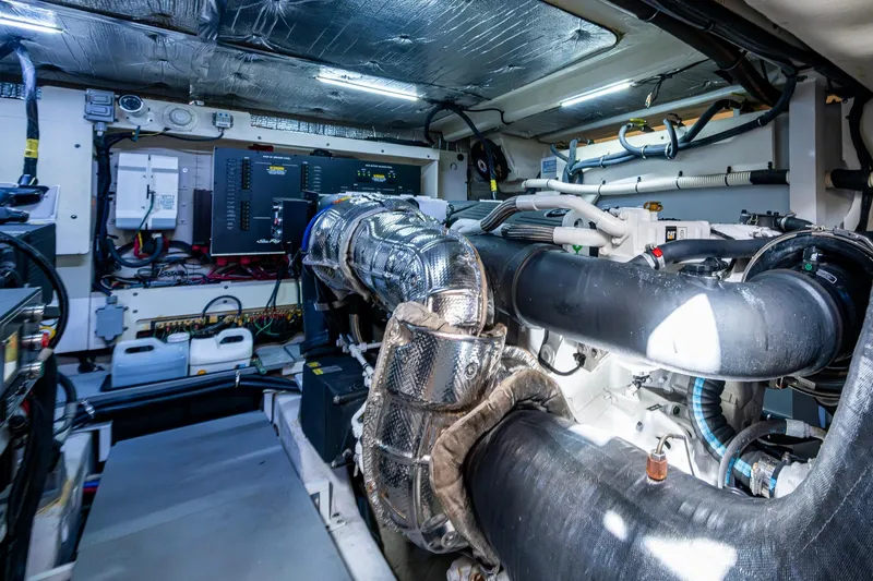  Yacht Photos Pics Engine room of 2018 Sea Ray L550 Fly yacht, showcasing advanced machinery and components.