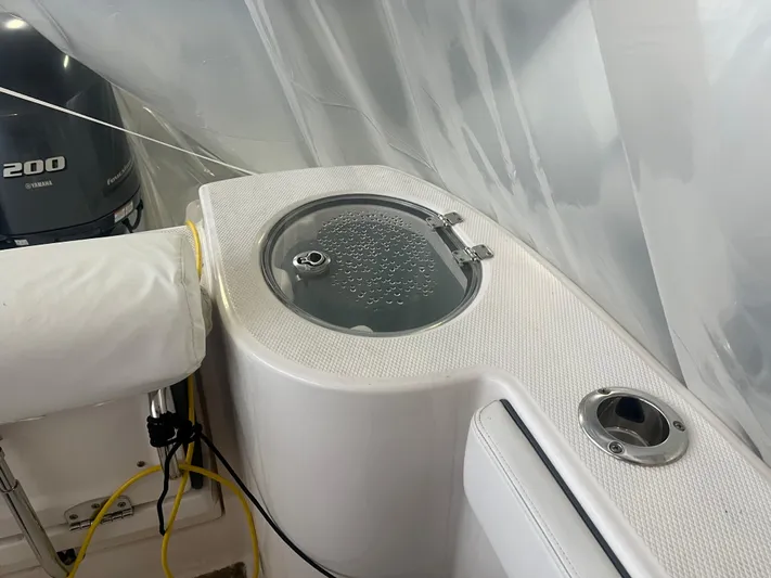  Yacht Photos Pics 2021 Robalo R272 Center Console boat with livewell and Yamaha 200 engine.