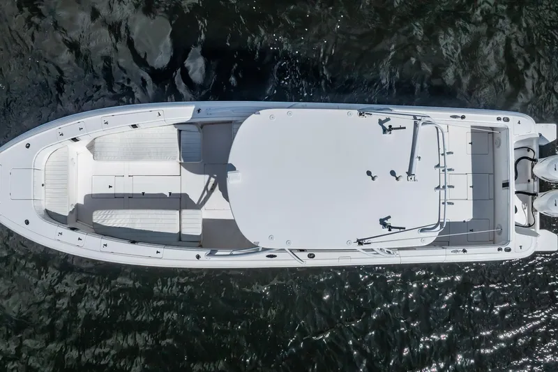  Yacht Photos Pics Aerial view of 2011 Intrepid 400 Center Console boat on water.