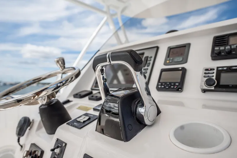  Yacht Photos Pics Close-up of 2011 Intrepid 400 Center Console boat controls and steering wheel.