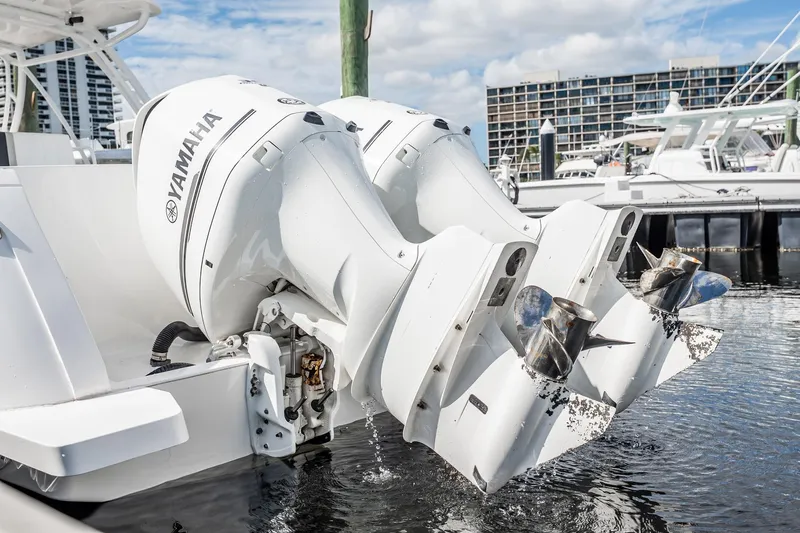  Yacht Photos Pics Twin Yamaha outboard engines on a 2011 Intrepid 400 Center Console boat at a marina.