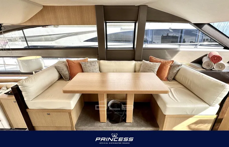  Yacht Photos Pics Luxurious interior of 2012 Princess 64 yacht with elegant seating and dining area.