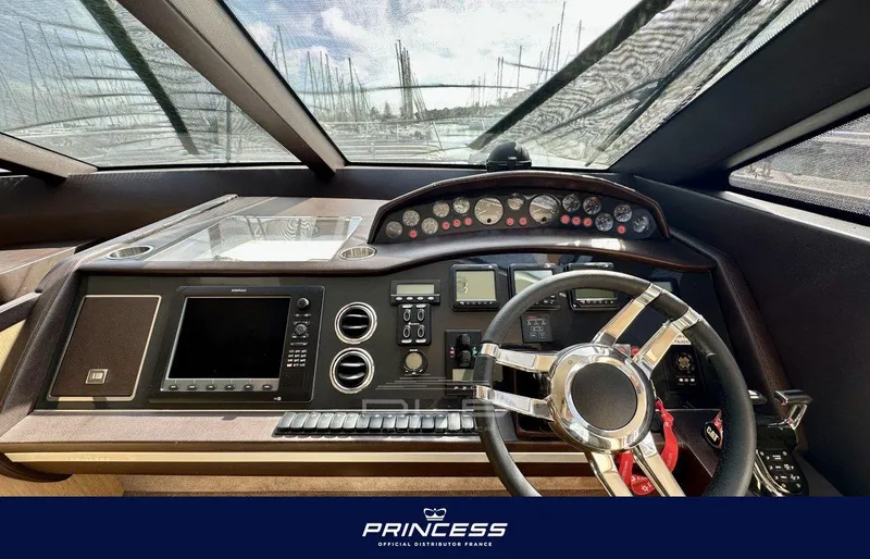  Yacht Photos Pics Luxurious 2012 Princess 64 yacht cockpit with advanced navigation controls and sleek design.