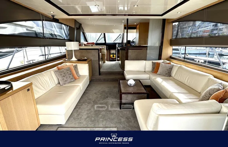  Yacht Photos Pics Luxurious interior of 2012 Princess 64 yacht with elegant seating and modern decor.