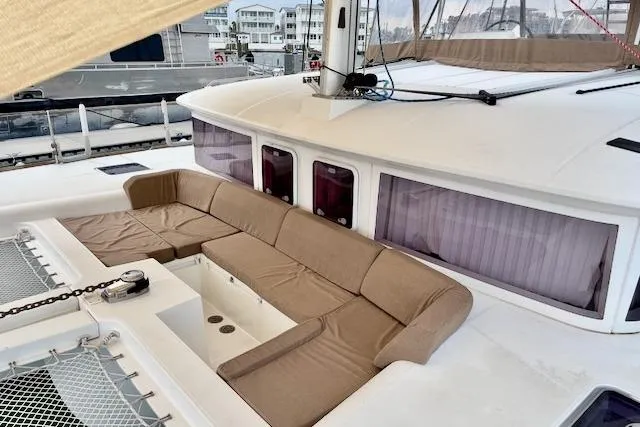 Audacity Yacht Photos Pics 2013 Lagoon 450 catamaran with spacious outdoor seating and modern design.