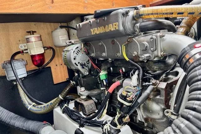 Audacity Yacht Photos Pics Engine compartment of a 2013 Lagoon 450 catamaran with Yanmar engine components.