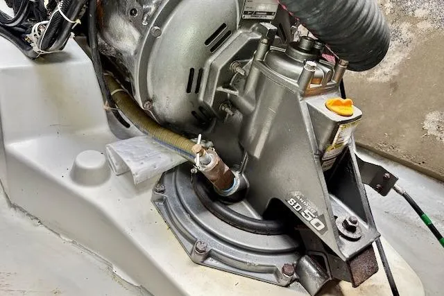 Audacity Yacht Photos Pics Engine compartment of a 2013 Lagoon 450 yacht, featuring mechanical components and hoses.