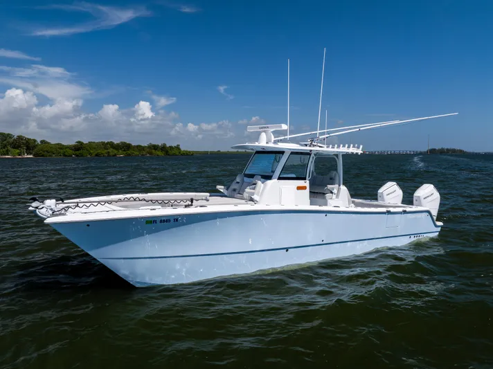  Yacht Photos Pics 2024 Freeman 35 boat on open water under clear blue sky.