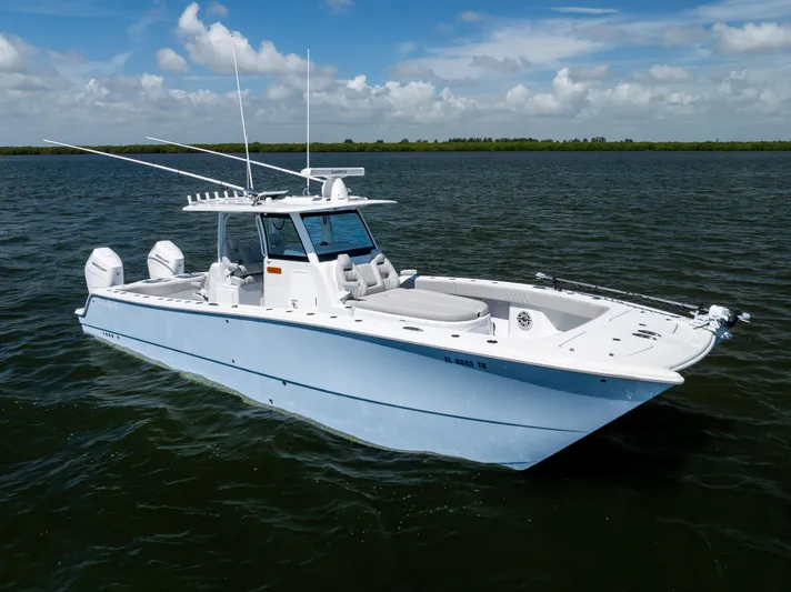  Yacht Photos Pics 2024 Freeman 35 boat on open water under blue sky.