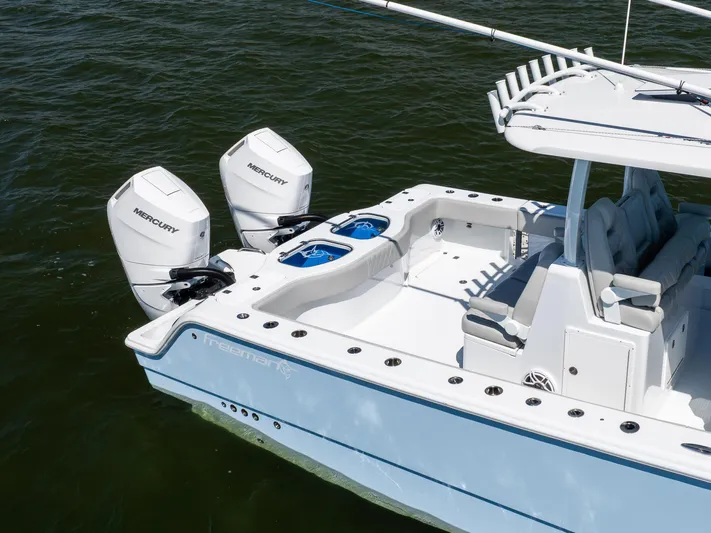  Yacht Photos Pics 2024 Freeman 35 boat with dual Mercury engines on water.