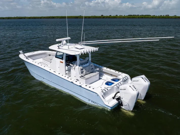  Yacht Photos Pics 2024 Freeman 35 boat with dual Mercury engines on open water.