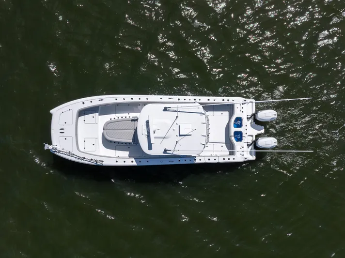  Yacht Photos Pics Aerial view of 2024 Freeman 35 boat on water, showcasing sleek design and twin engines.