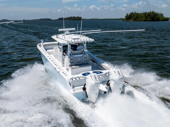  Yacht Photos Pics 2024 Freeman 35 boat cruising on open water with twin engines.