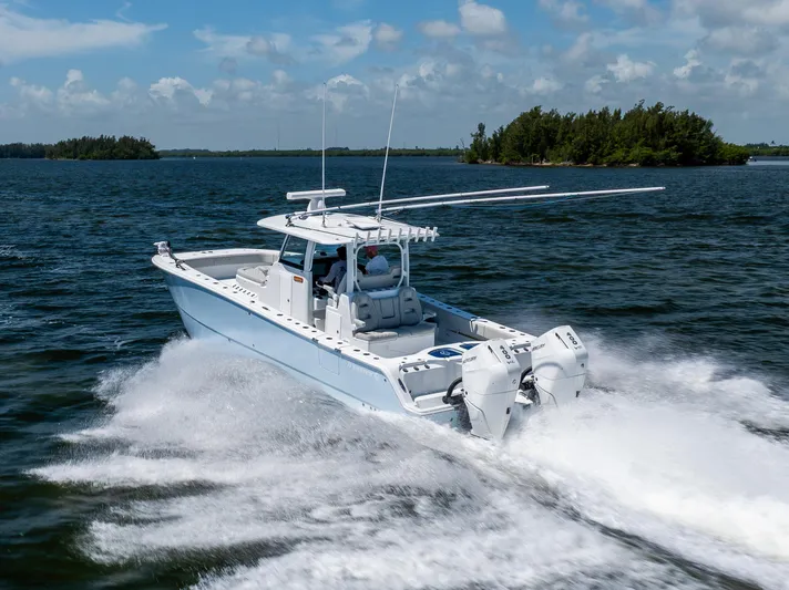  Yacht Photos Pics 2024 Freeman 35 boat cruising on open water with twin engines.