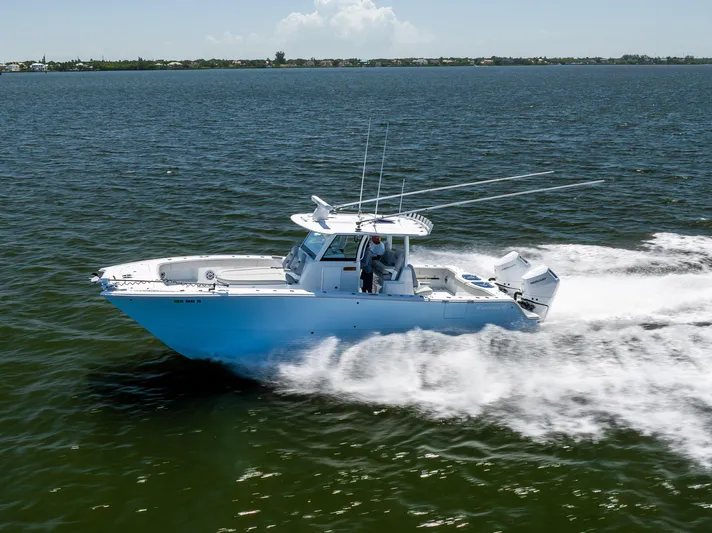  Yacht Photos Pics 2024 Freeman 35 boat cruising on open water, showcasing speed and performance.