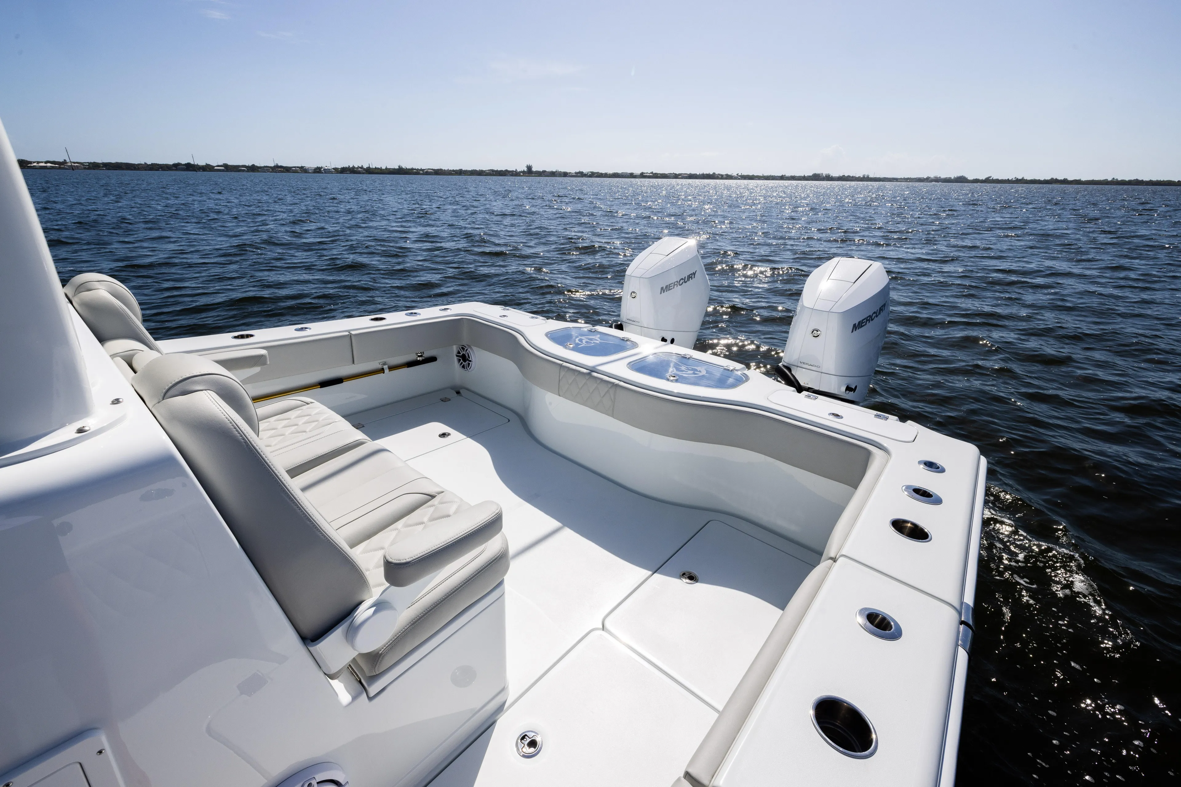  Yacht Photos Pics 2024 Freeman 35 boat with dual Mercury engines on open water.