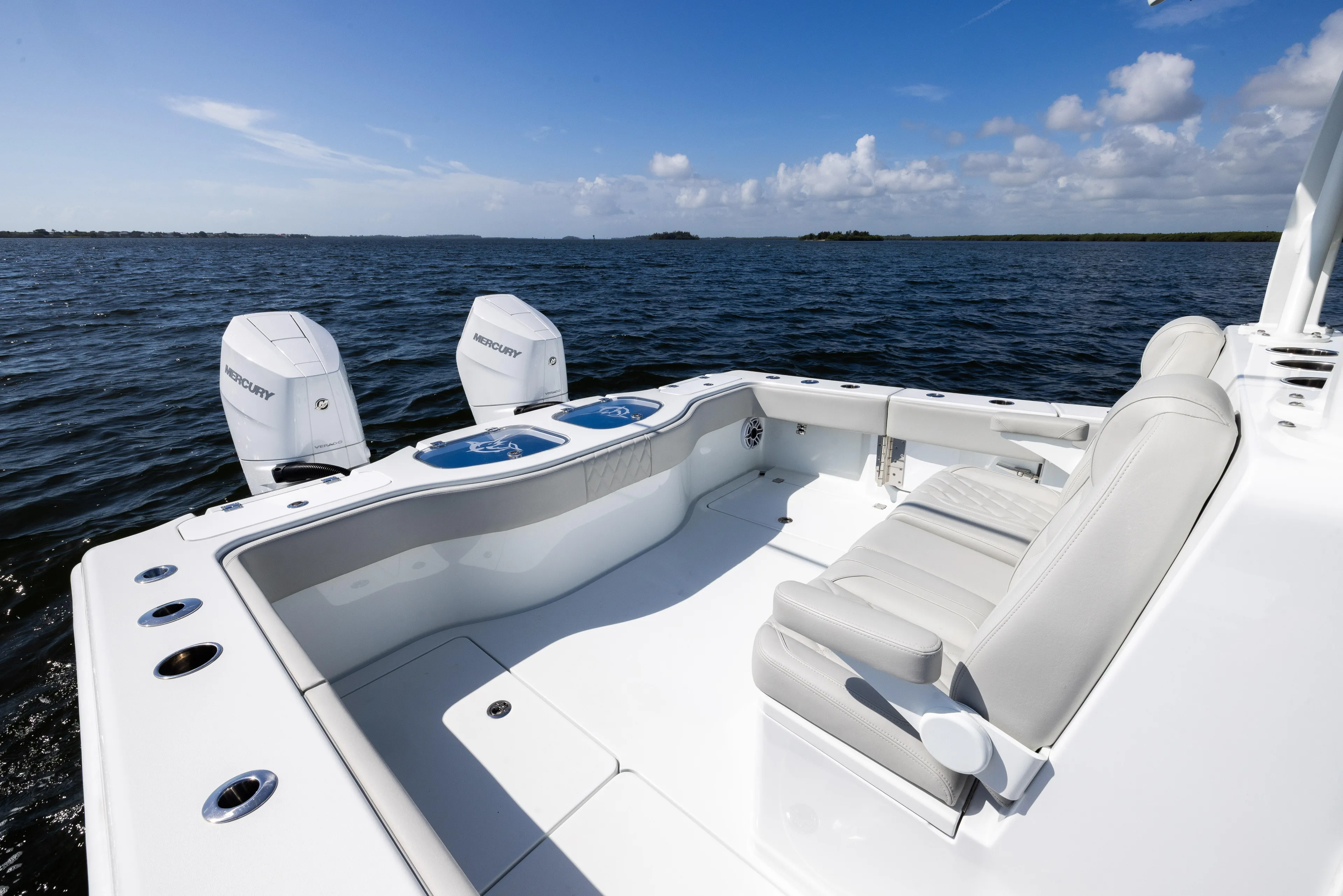  Yacht Photos Pics 2024 Freeman 35 boat with dual Mercury engines on open water.