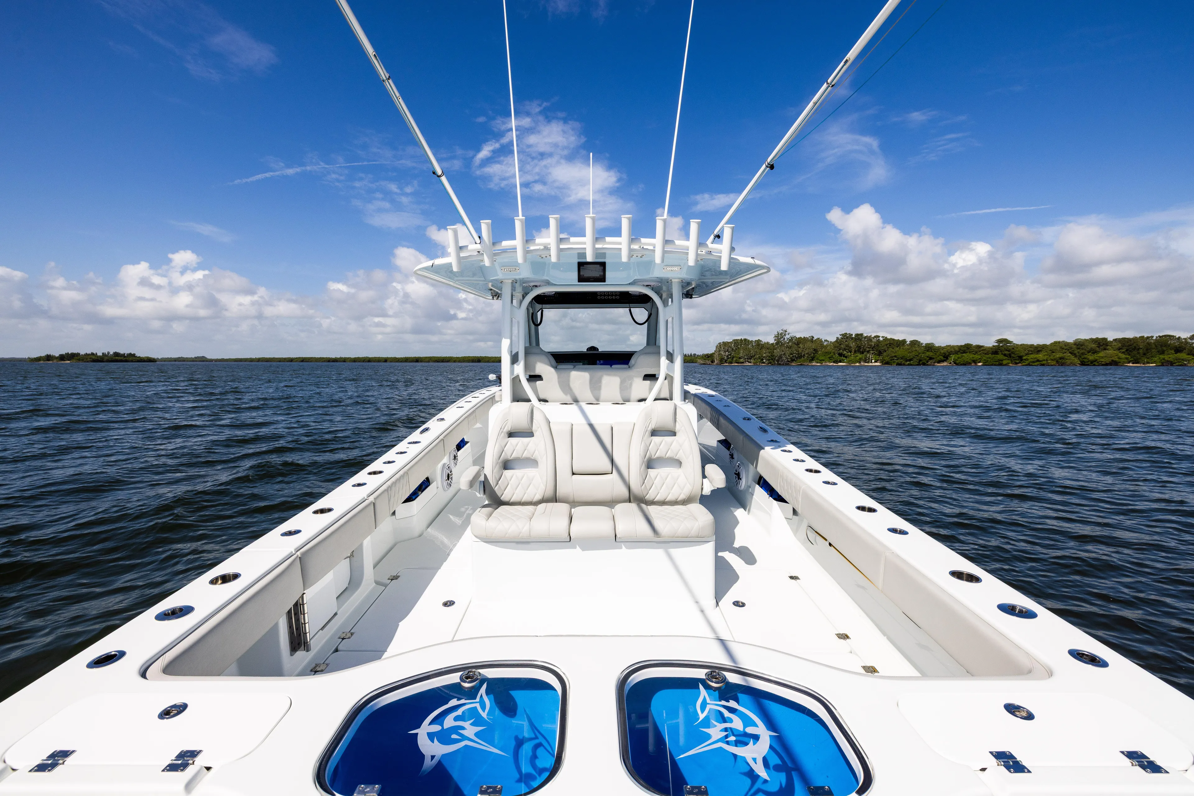 Yacht Photos Pics 2024 Freeman 35 boat on open water under clear blue sky.