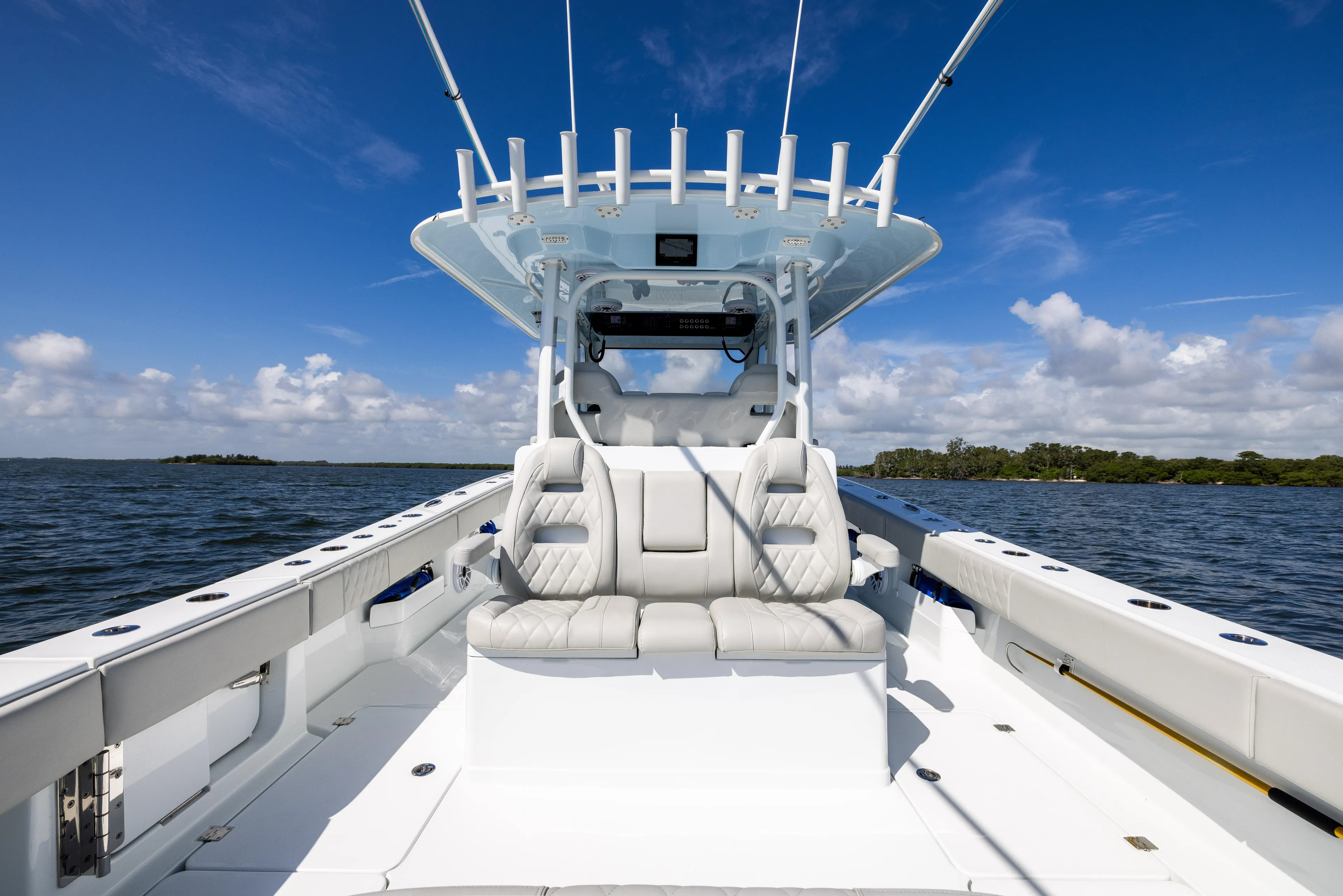  Yacht Photos Pics 2024 Freeman 35 boat interior with white seating on open water.