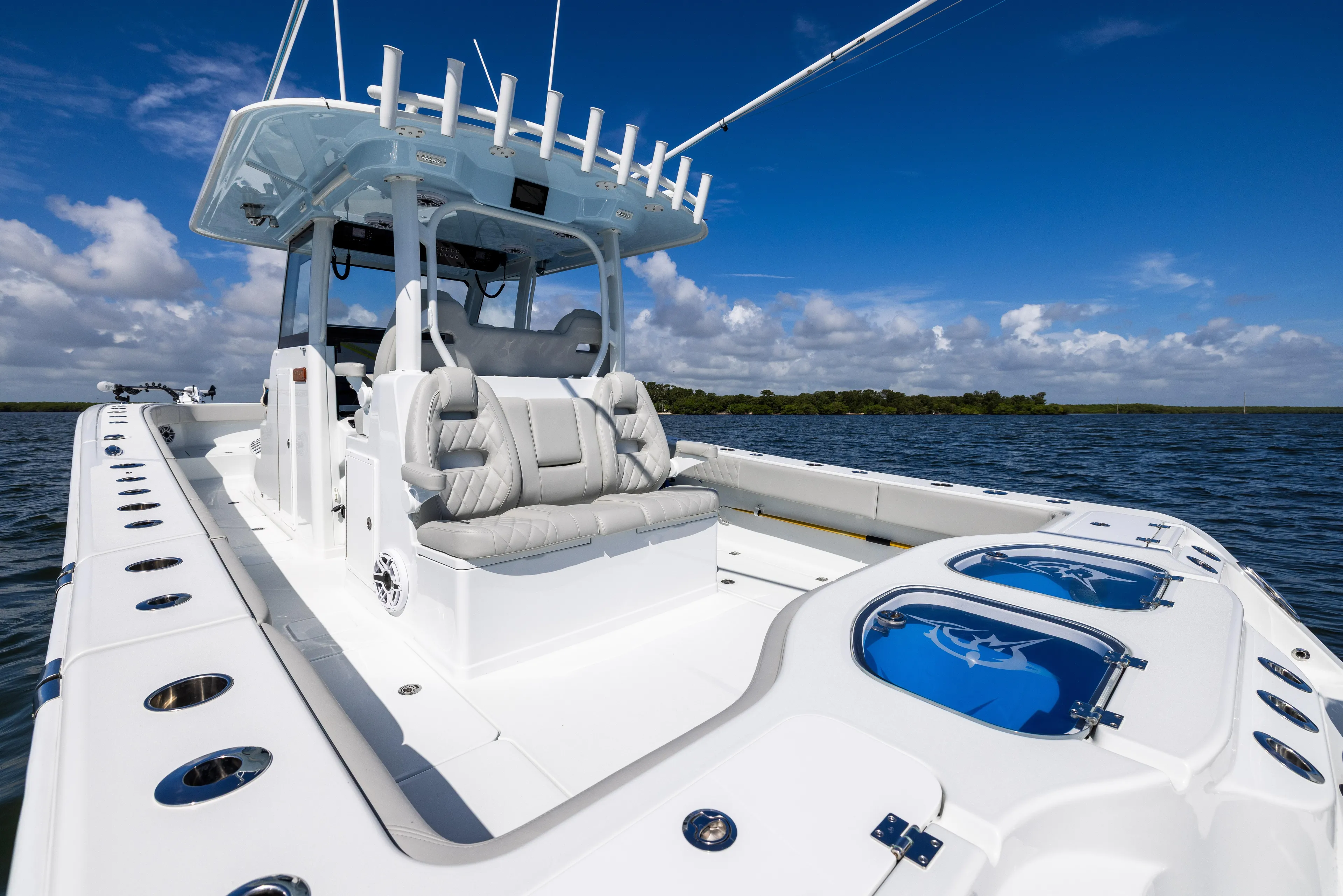  Yacht Photos Pics 2024 Freeman 35 boat on water, featuring sleek design and luxurious seating.