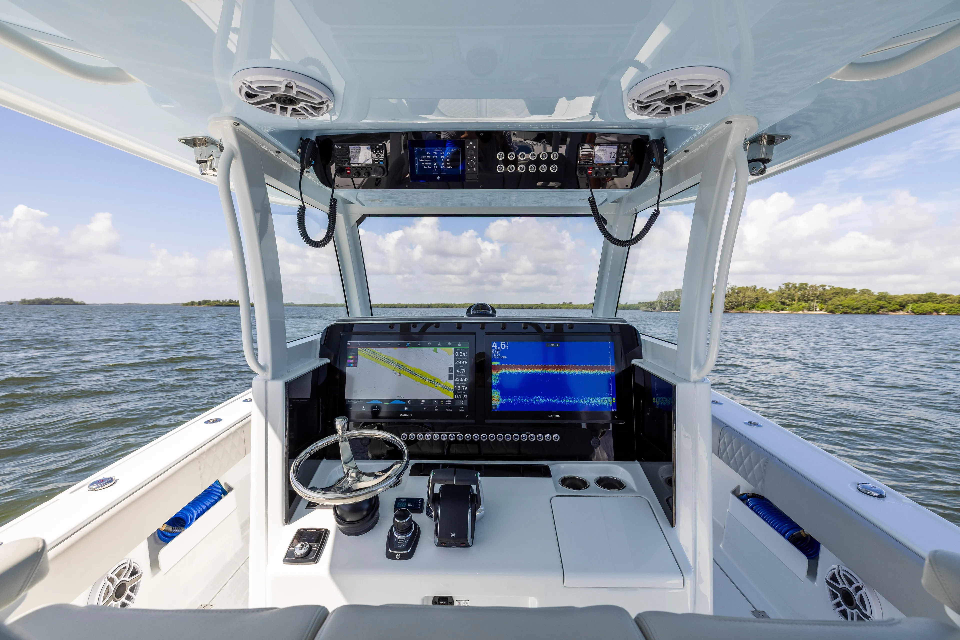  Yacht Photos Pics Interior view of 2024 Freeman 35 boat cockpit with advanced navigation system.