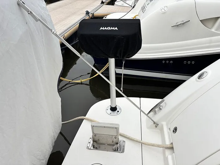  Yacht Photos Pics Sea Ray 450 Sedan Bridge 2013 with Magma grill on deck, docked at marina.