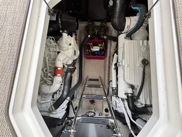 Yacht Photos Pics Engine room of 2013 Sea Ray 450 Sedan Bridge with visible components and ladder.