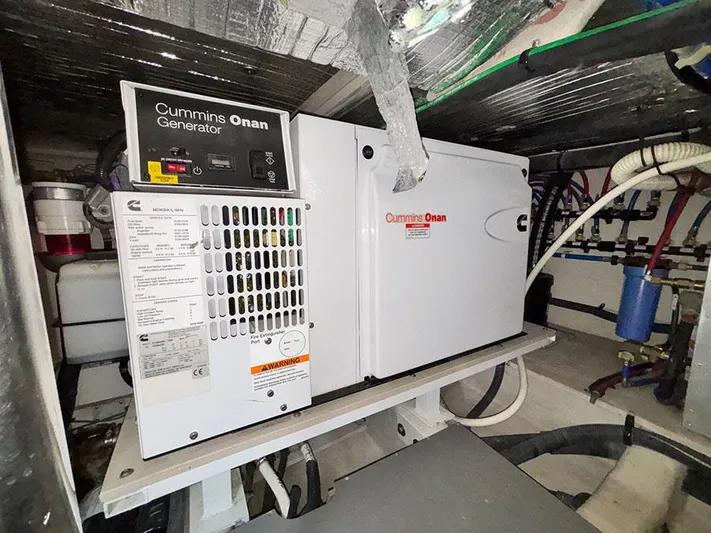  Yacht Photos Pics Cummins Onan generator in 2013 Sea Ray 450 Sedan Bridge engine room.
