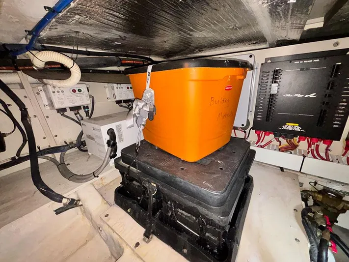  Yacht Photos Pics Engine room of 2013 Sea Ray 450 Sedan Bridge with equipment and orange container.
