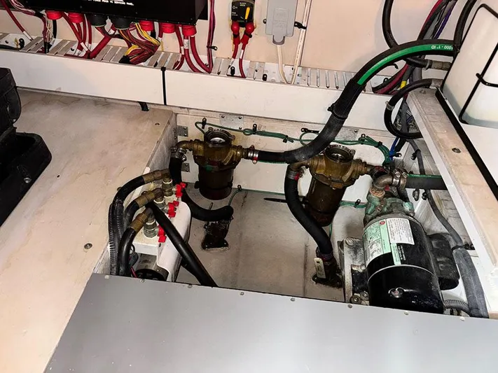  Yacht Photos Pics Engine compartment of a 2013 Sea Ray 450 Sedan Bridge with visible wiring and components.