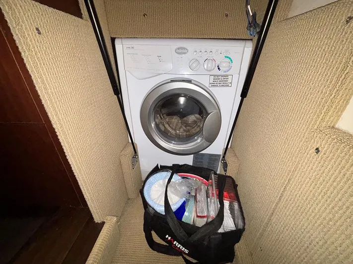  Yacht Photos Pics Washing machine inside 2013 Sea Ray 450 Sedan Bridge yacht with storage bag.