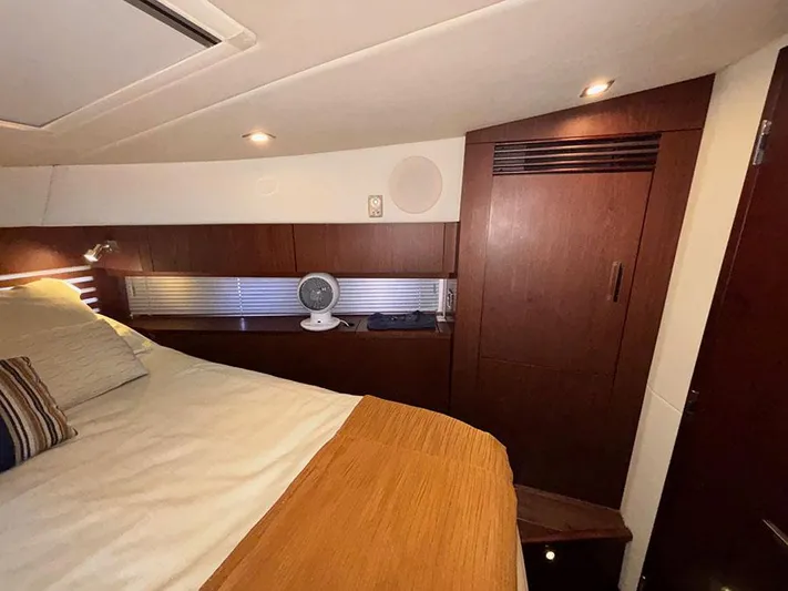  Yacht Photos Pics Luxurious cabin interior of 2013 Sea Ray 450 Sedan Bridge yacht with modern wood finishes.