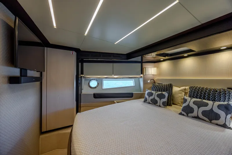  Yacht Photos Pics Luxurious bedroom interior of 2019 Azimut 66 Flybridge yacht with modern design.
