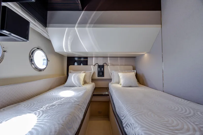  Yacht Photos Pics Luxurious twin cabin interior of 2019 Azimut 66 Flybridge yacht.