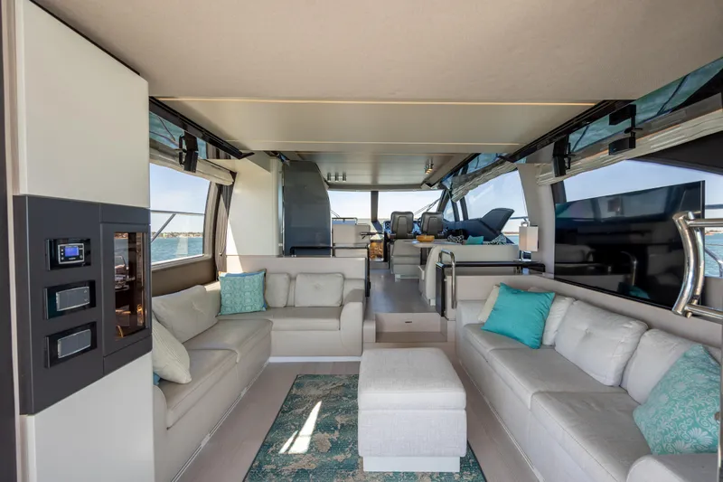  Yacht Photos Pics Luxurious interior of 2019 Azimut 66 Flybridge yacht with elegant seating and modern design.